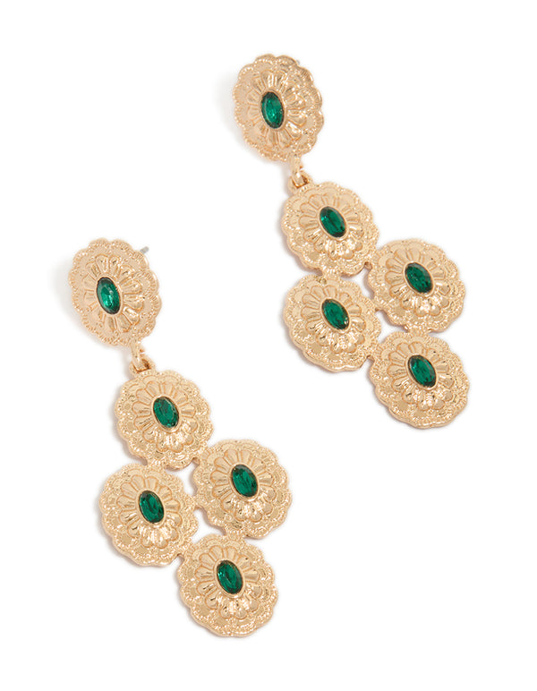 Statement drop earrings in gold medallions with dark green diamante stones front view