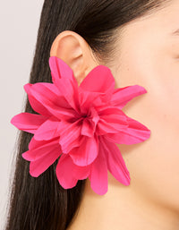 Featuring statement floral fabric flower petal earrings in gold and pink on ear view - link has visual effect only
