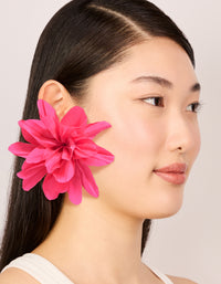 Crafted with statement floral fabric flower petal earrings in gold and pink on model view - link has visual effect only