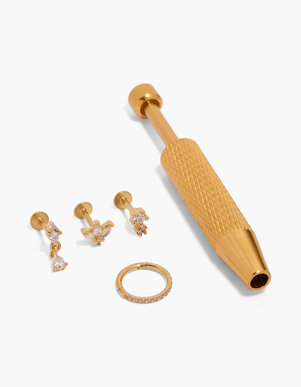 Showcasing floral stud earrings with cubic zirconia, crafted from gold plated surgical steel featuring flat back closure and tool front view