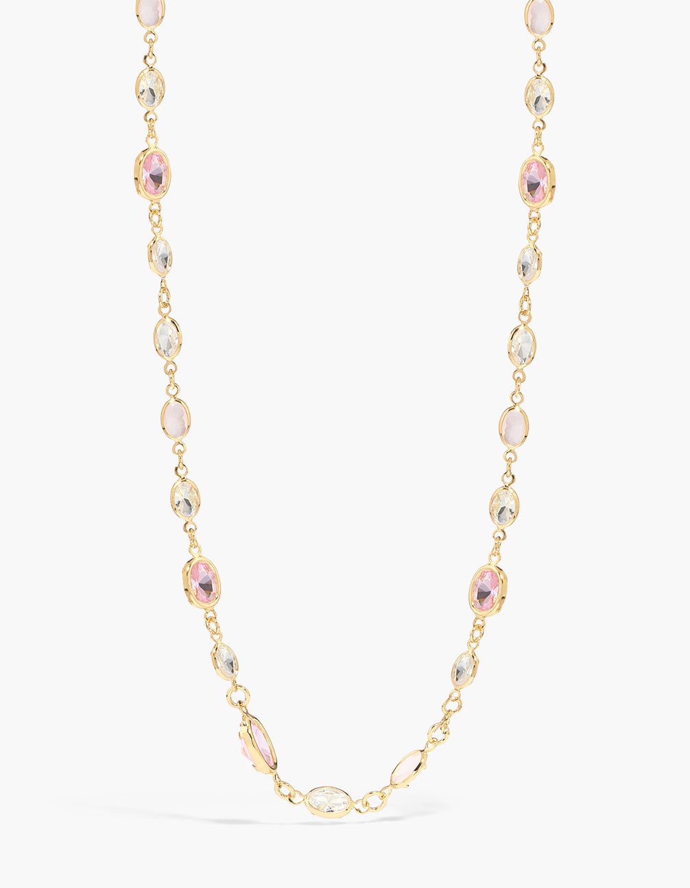 Showcasing a gold plated pink cubic zirconia ovals necklace close up view