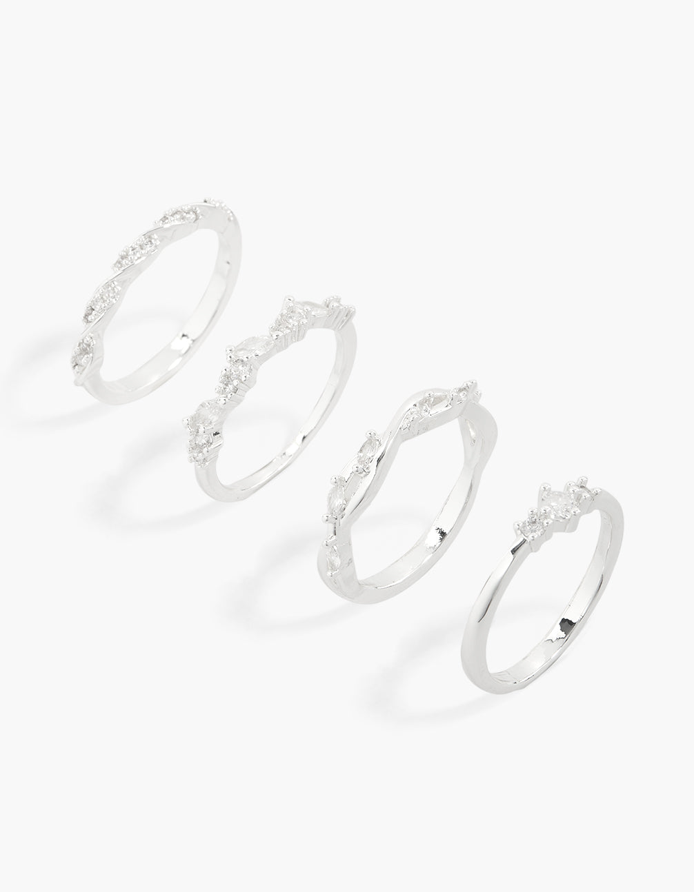 Showcasing silver plated cubic zirconia winding stacking rings 4-pack in dainty style front view