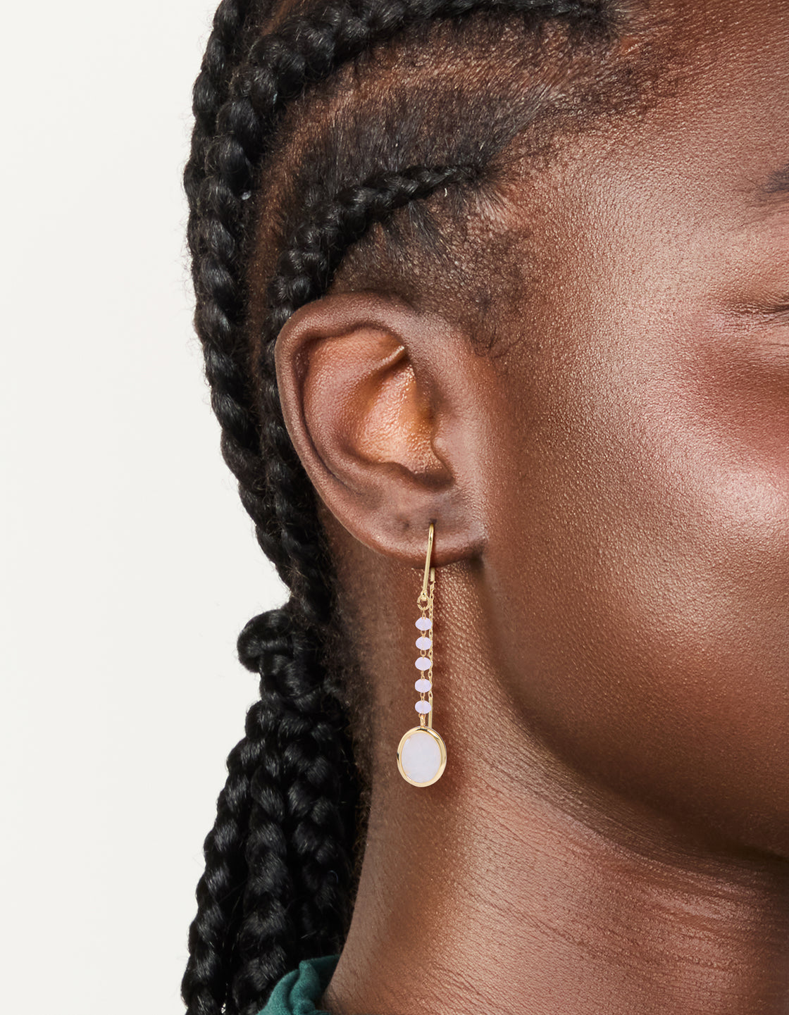 Stunning threader earrings featuring pink beads and rose quartz drop in gold plated statement style on ear view