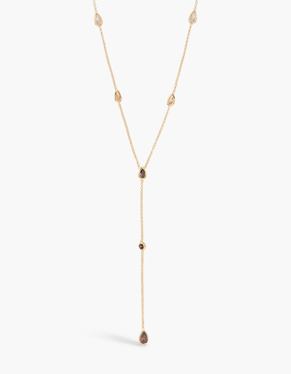 Showcasing a gold plated cognac and clear cubic zirconia lariat necklace front view