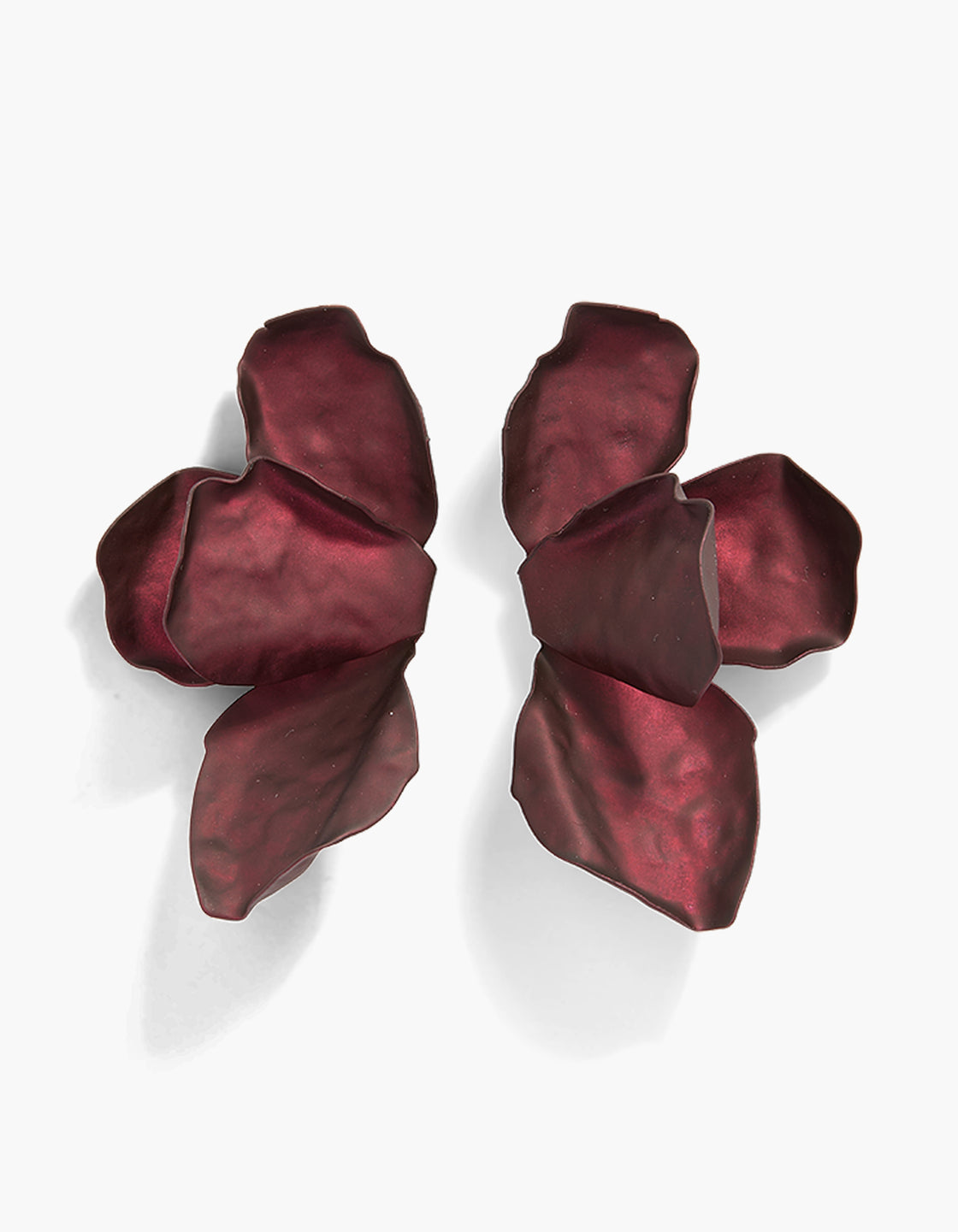 Exquisite statement drop earrings with floral petal design in burgundy coated metal front view