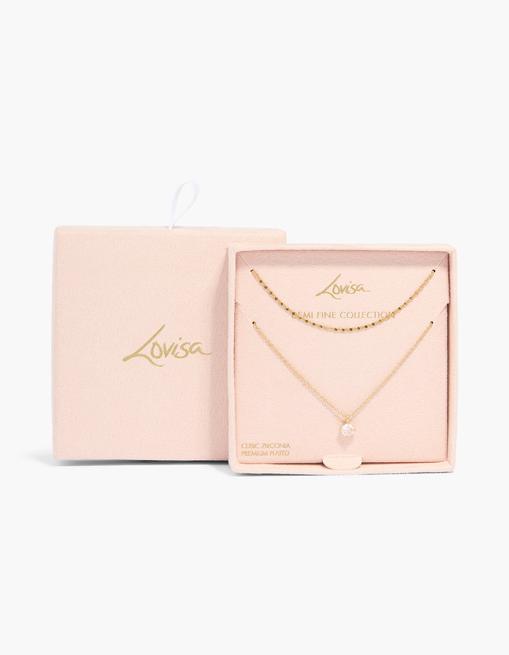 Showcasing a gold plated necklace with round cubic zirconia pendant in a 2-pack set close up view